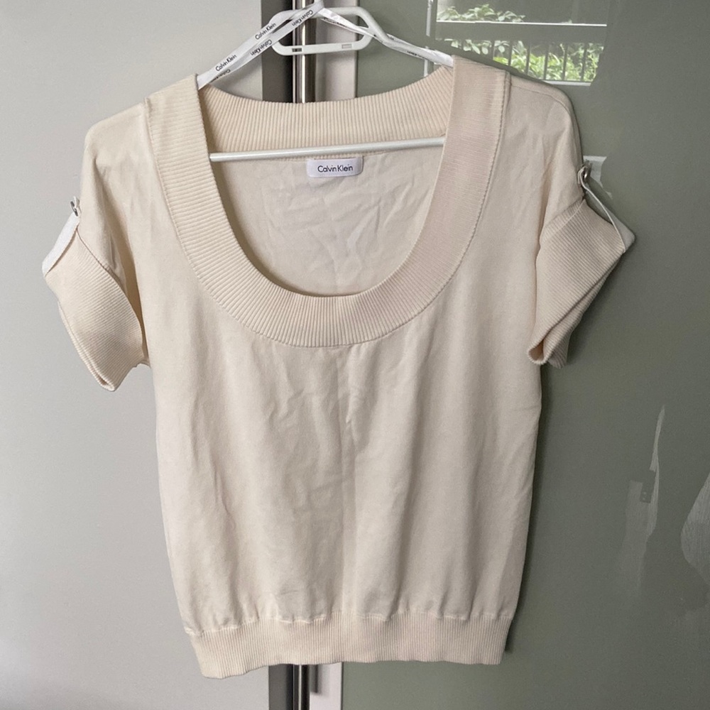 Cream coloured knit Calvin Klein short sleeved shirt